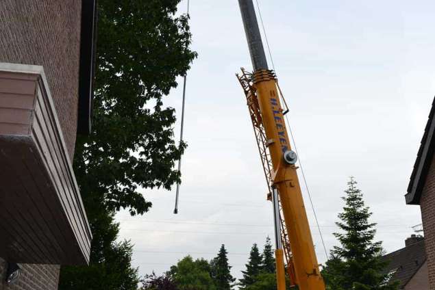 leveren van zand en stenen in Den Bosch  uitgraven zandbed in Waalwijk Breda Den Bosch en omstreken leggen van schellevis tegels 80x80x5 carbon antrasiet grijs Oisterwijk Udenhout Tilburg Gilze Rijen Drunen Waspik Vught